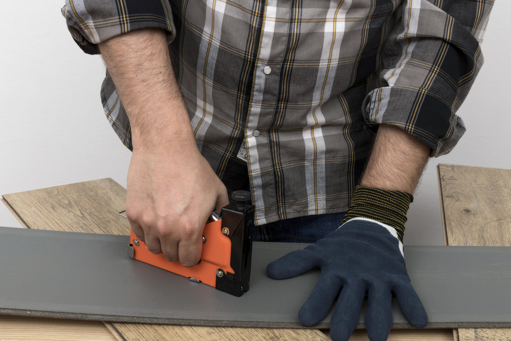 man-wearing-protection-gloves-carpentry-workshop-concept.jpg man-wearing-protection-gloves-carpentry-workshop-concept.jpg